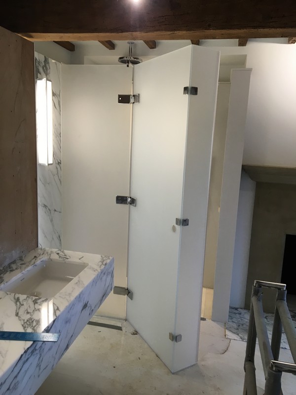 Bespoke frosted glass shower enclosure in South Woodford luxury bathroom