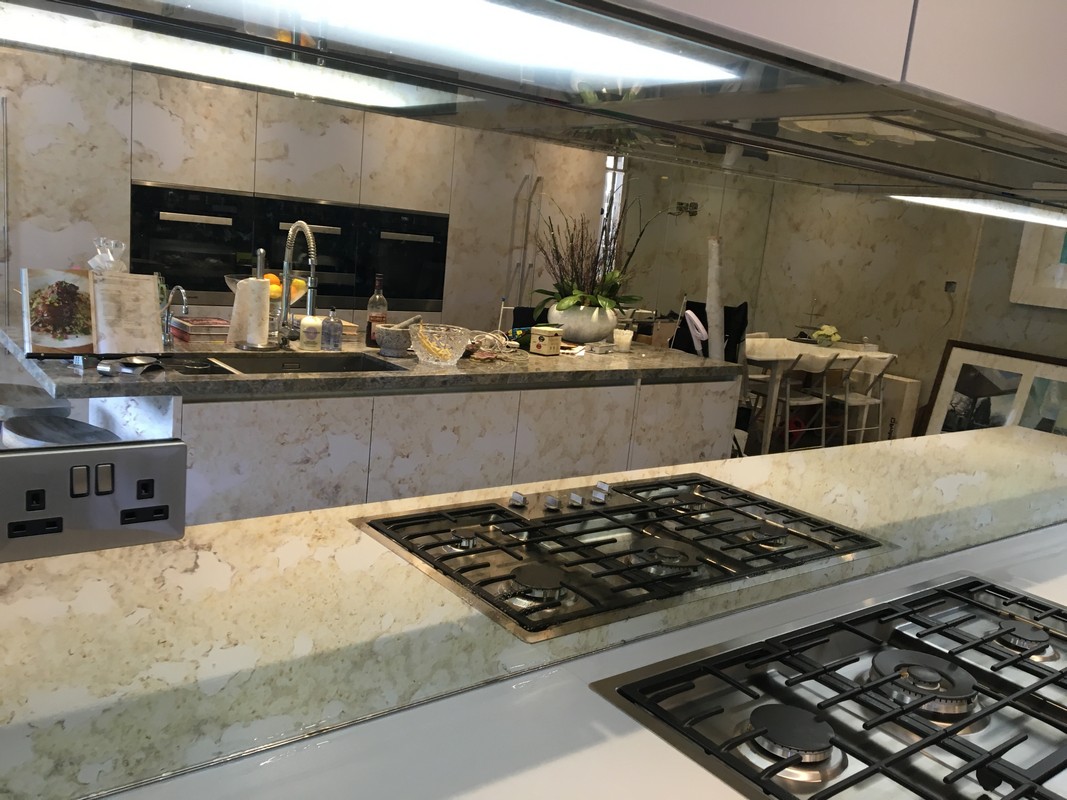Mirror glass splashback in South Woodford luxury kitchen