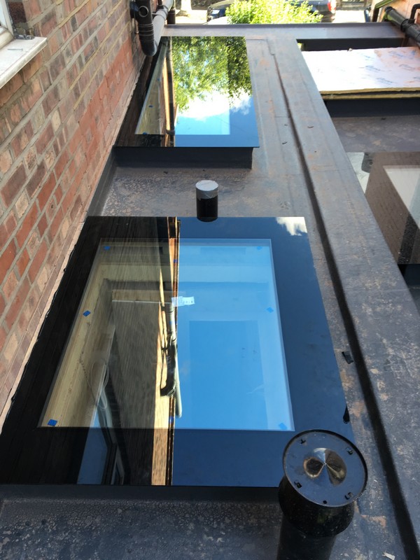 Multiple flat roof skylights on extension in South Woodford